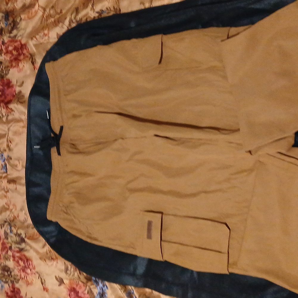 A pair of polyester pants brand new without the tags size large